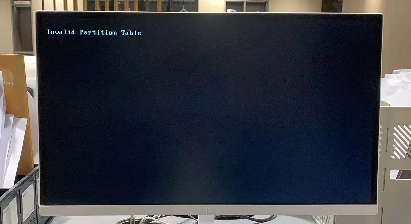 问题画面，Win7开机提示Invalid Partition Table的解决方案.png